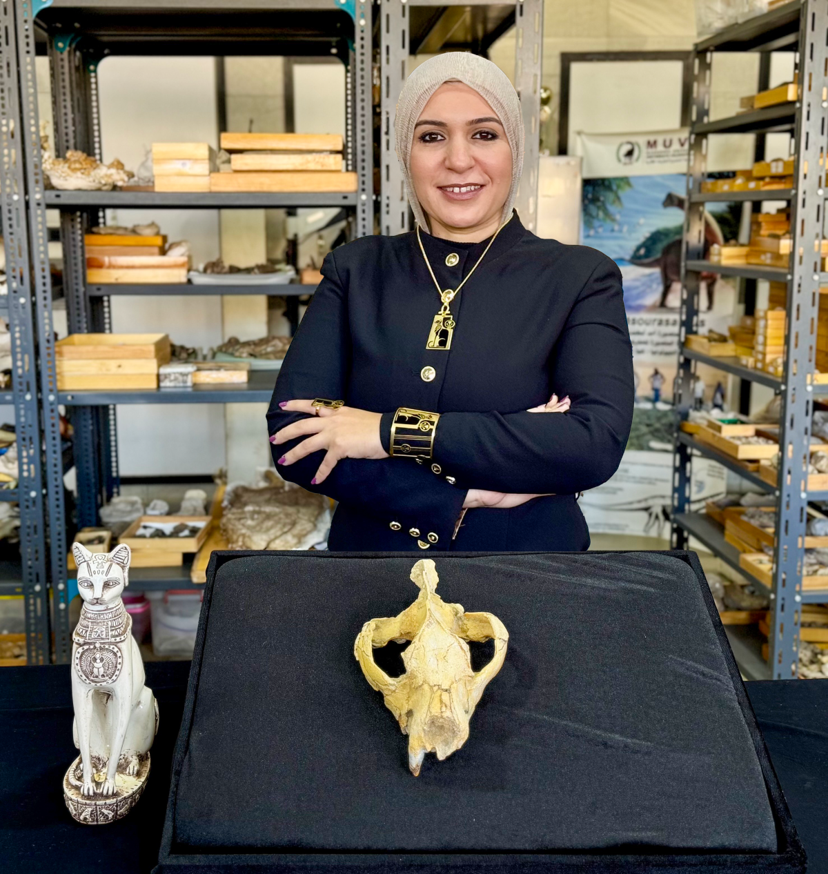 Shorouq Al-Ashqar poses with the Bastetodon skull