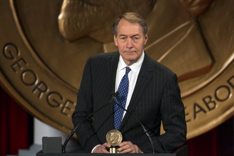 Journalist Charlie Rose speaks after winning a Peabody Award for his work in "One on One with Assad" in New York May 19, 2014.