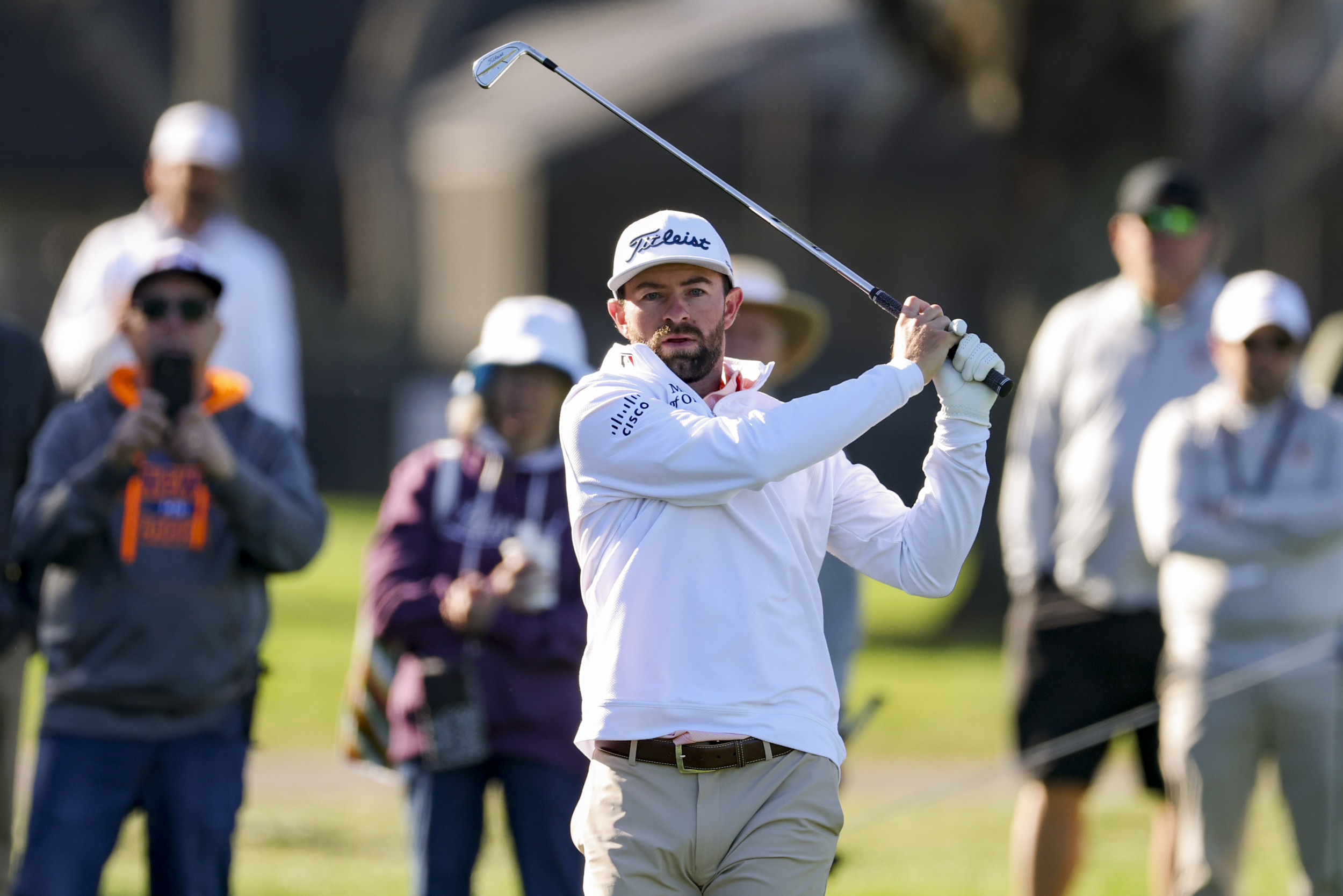 Cam Young duck hooks Arnold Palmer tee shot OB with AirPods in, cards 82