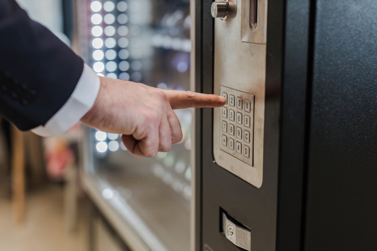 A man uses a vending machine