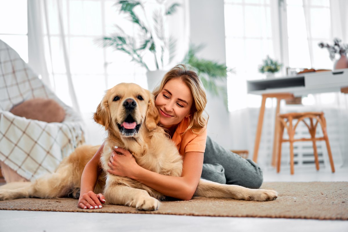 Woman with golden retriever