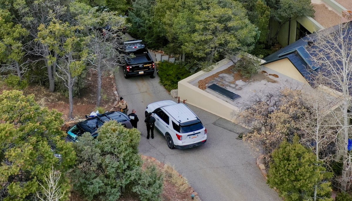 Police outside Hackman's home on Feb 27