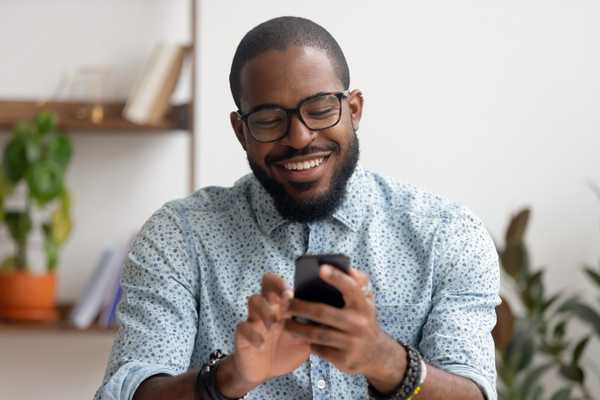 Stylish Businessman Glasses Uses Mobile Phone Office