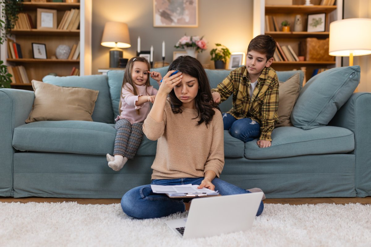 A stock image showing a stressed mom of two