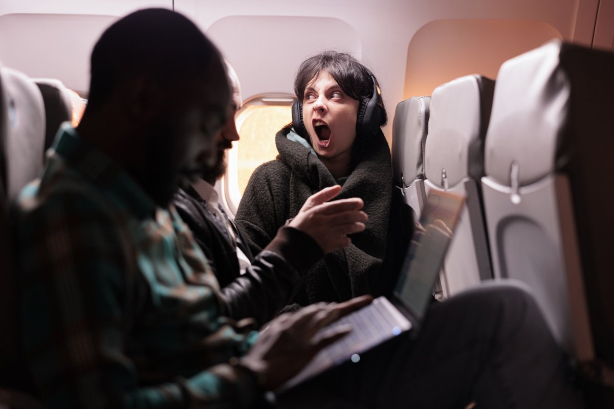 Passenger upset on plane.