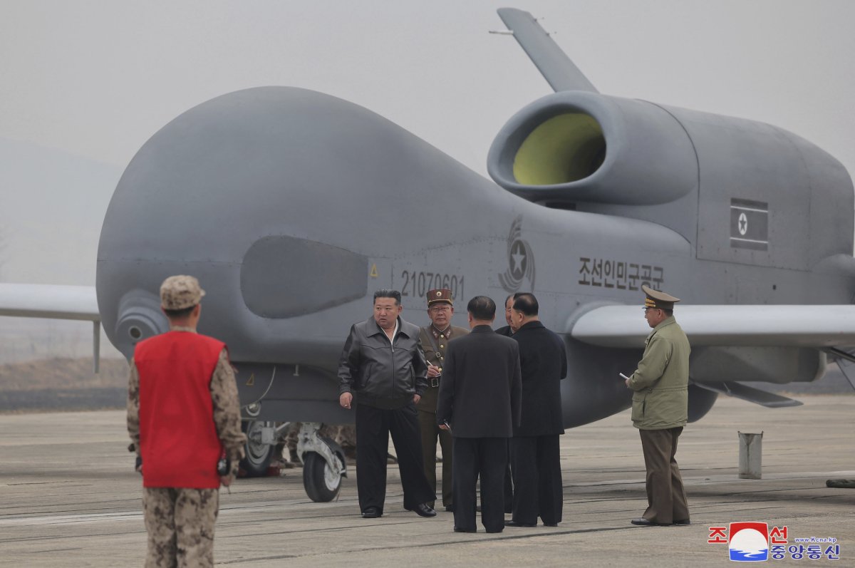 Kim Jong Un Standing With a Drone