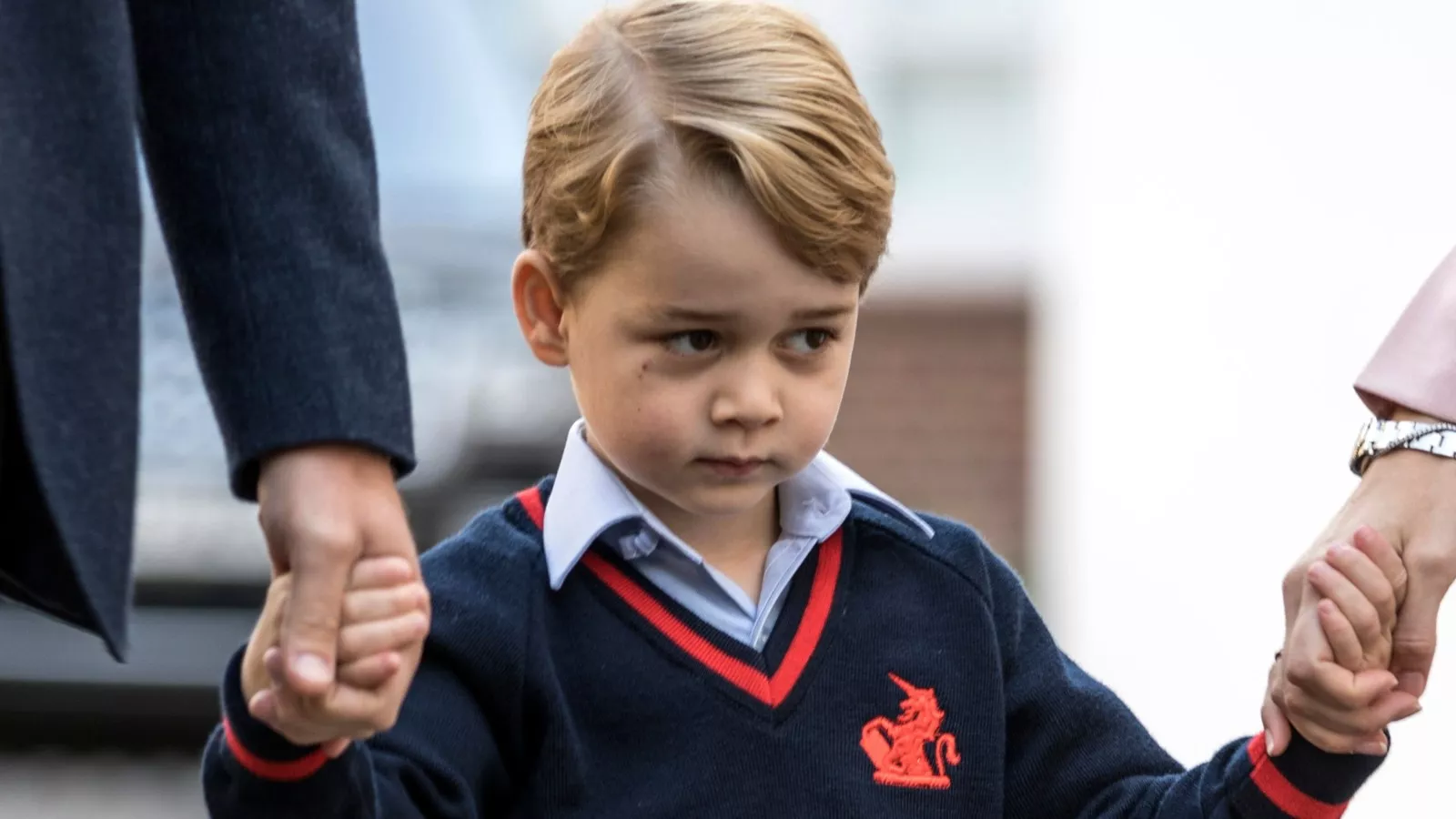 Prince George's nervous reaction to school photo op goes viral