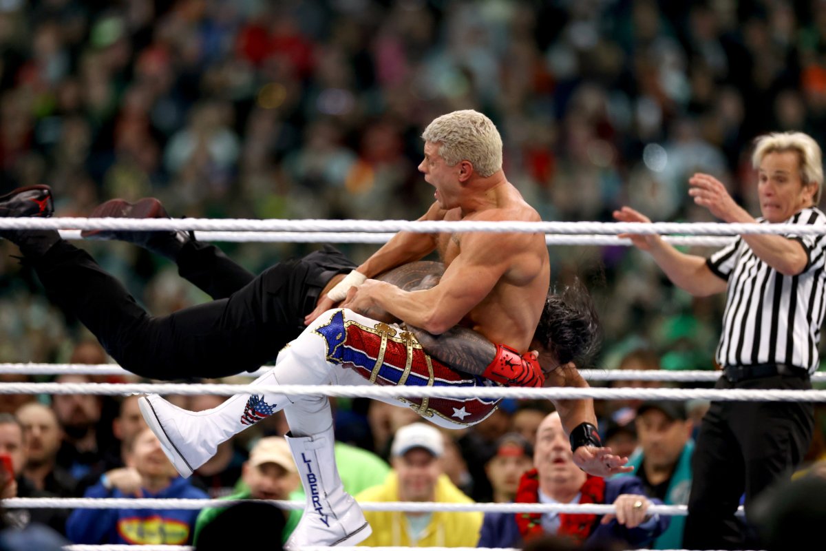WWE Roman Reigns Cody Rhodes Spear