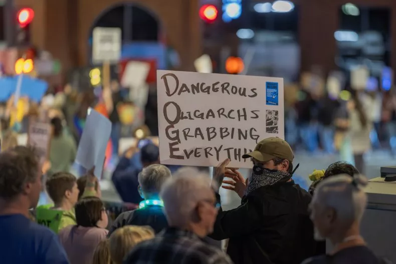 SikhoAI Crowd of shoppers rallying outside a Walmart store in 2025