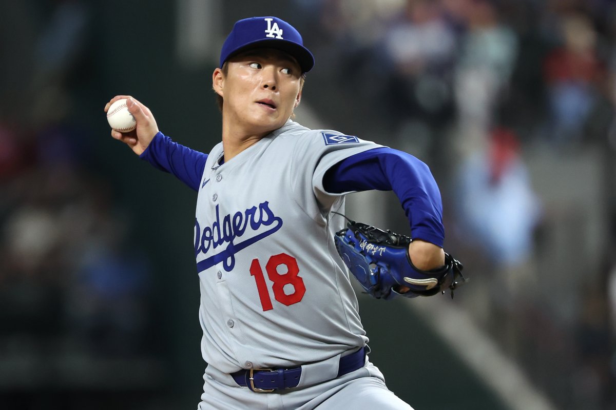 Yoshinobu Yamamoto throws pitch against the Rangers