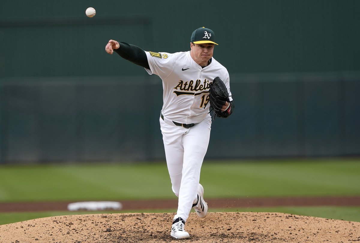 Mason Miller pitches in the ninth inning