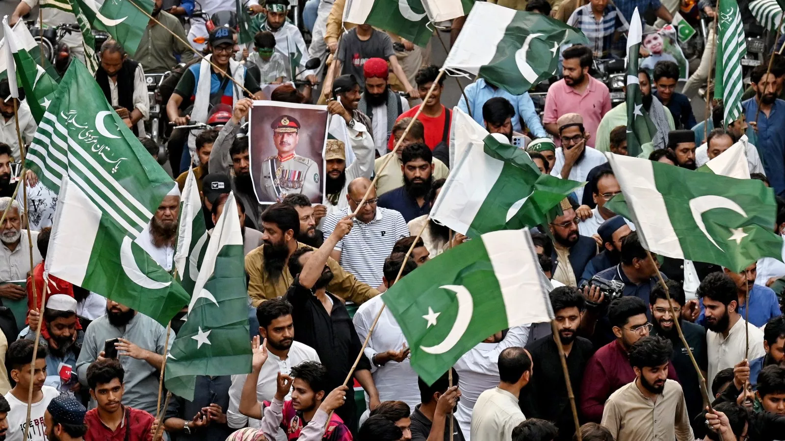 https://d.newsweek.com/en/full/2642887/pakistan-party-supporters-demonstrate.webp?w=1600&h=900&q=88&f=c5d9e97e3b68aa28f625a65b145950e3