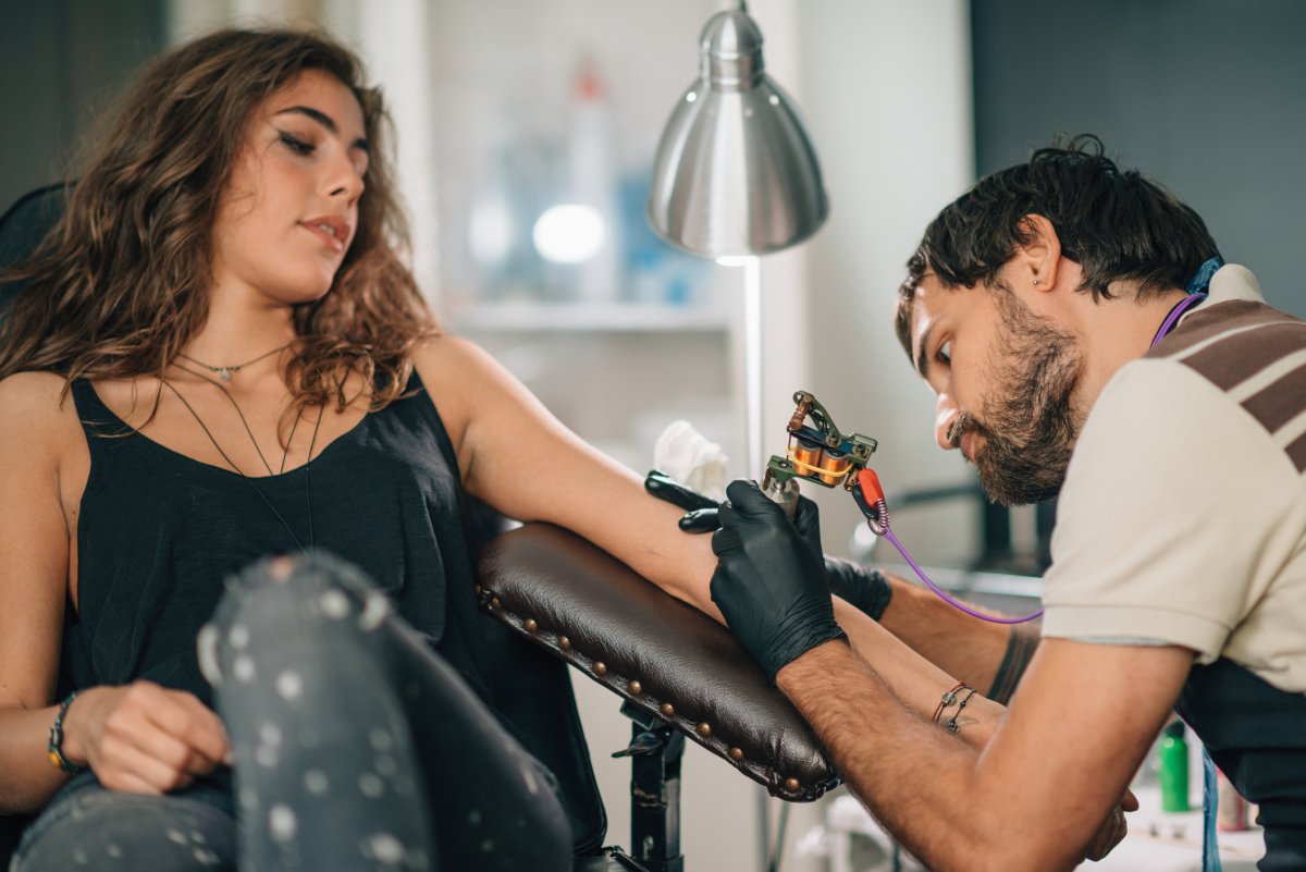 Stock image of tattooist.