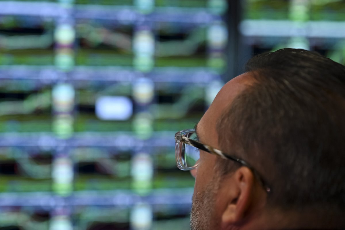 A trader watches a screen 
