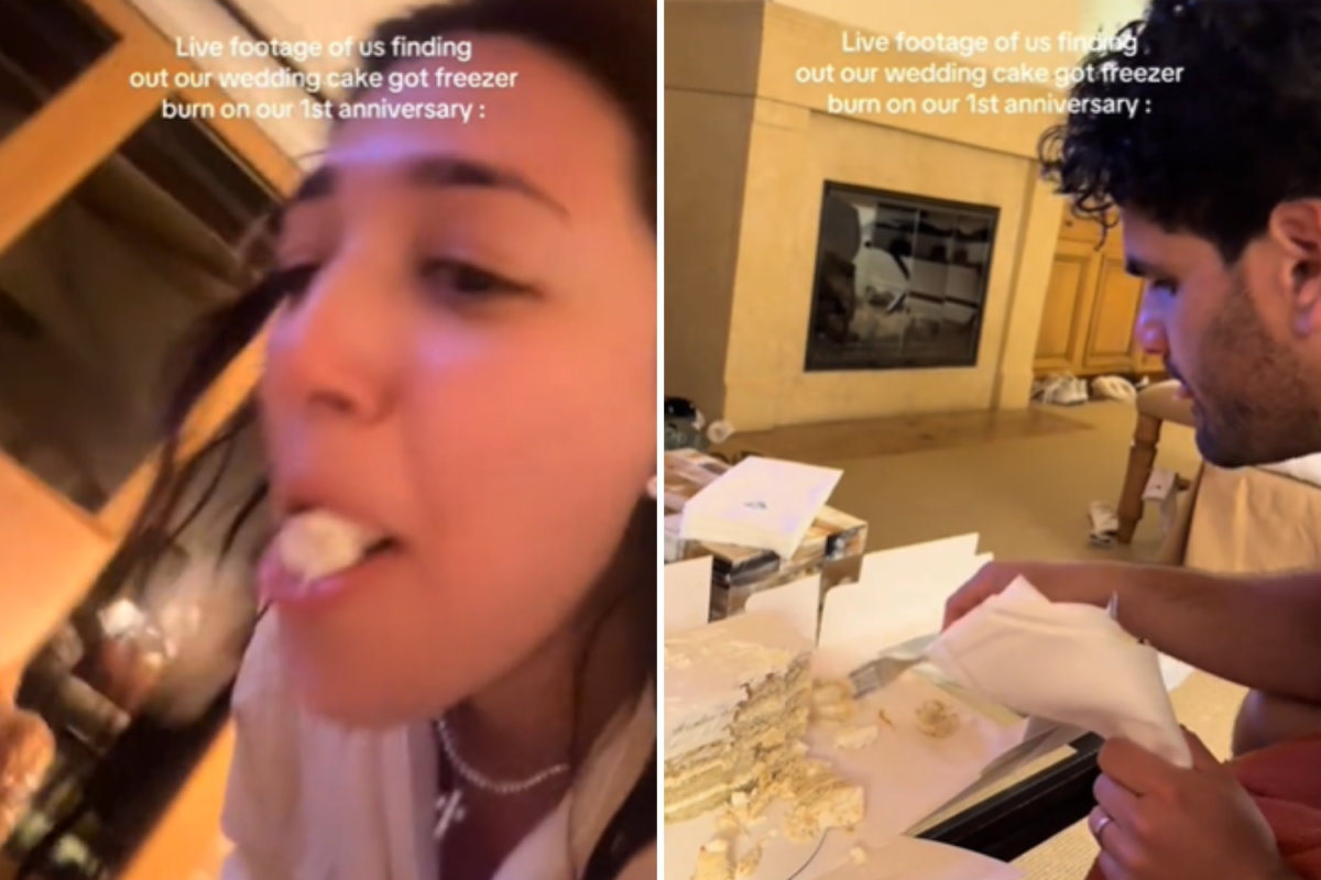 Couple taste wedding cake