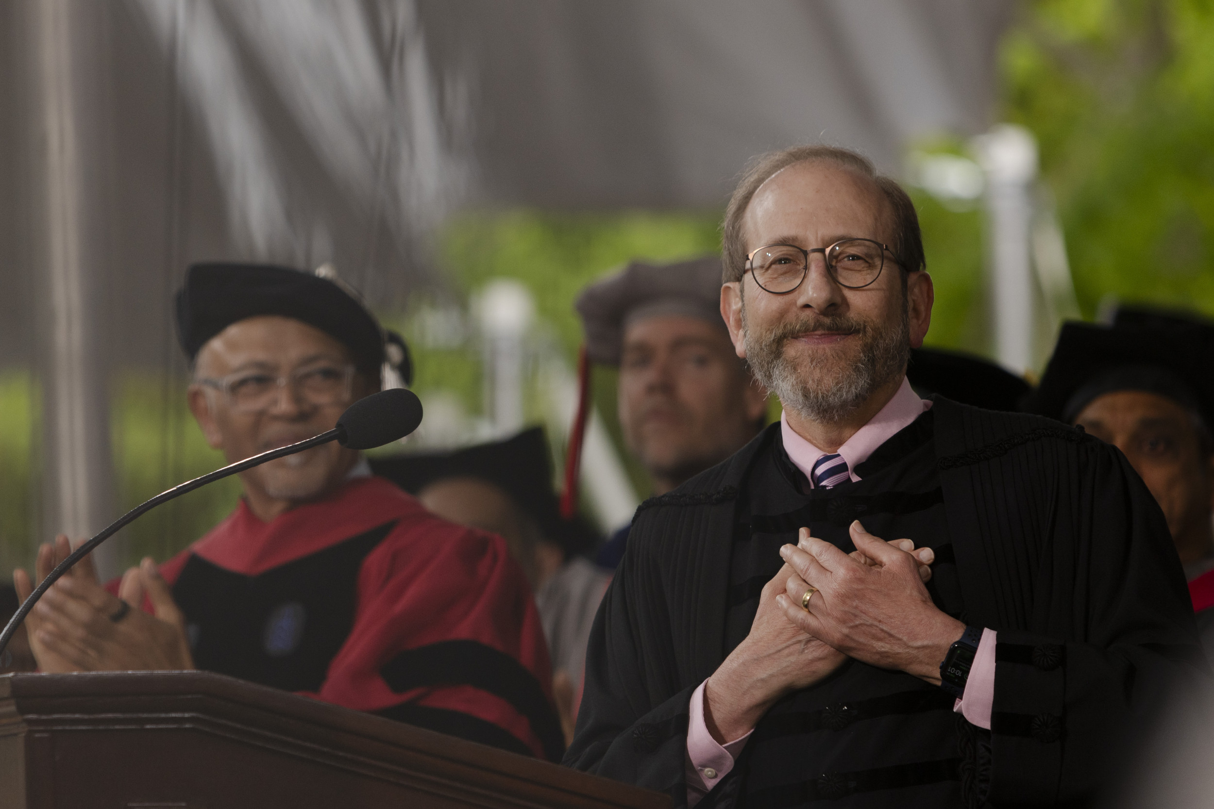 Harvard president's dig at Trump met with standing ovation at graduation