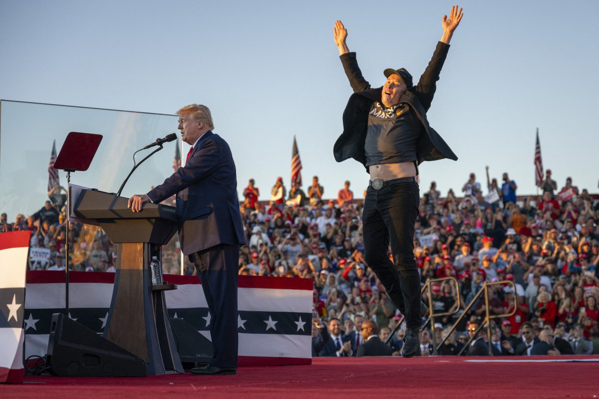 Elon Musk jumping at Trump rally