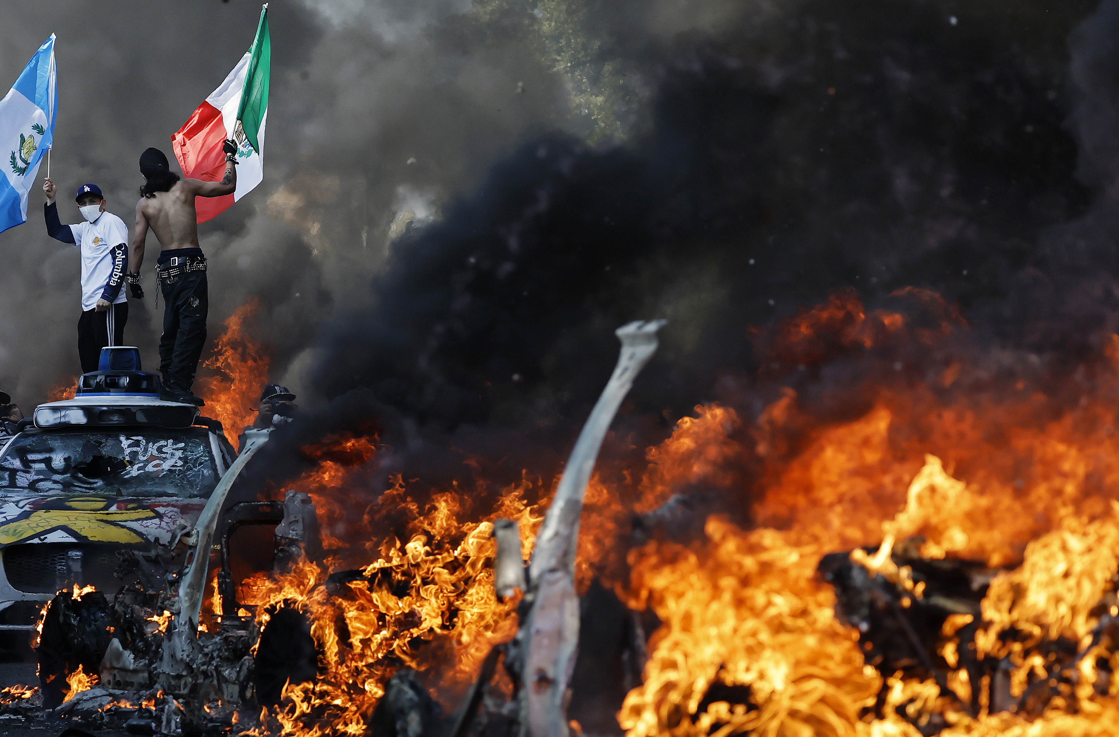 China, Hong Kong Warn Citizens Amid LA Unrest