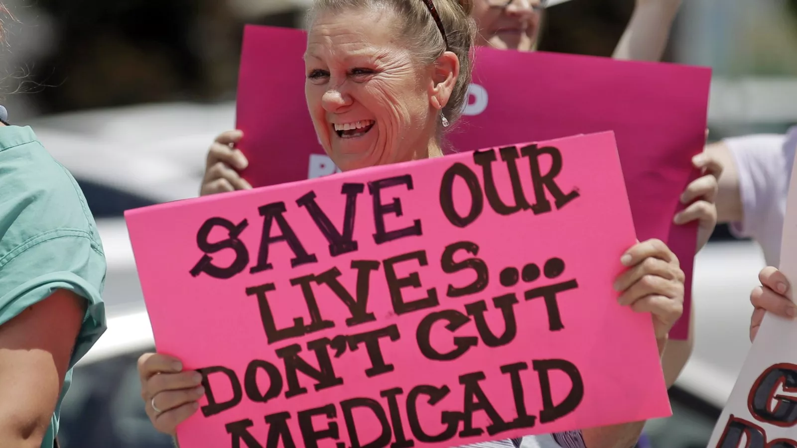 https://d.newsweek.com/en/full/2659406/medicaid-cuts-protest.webp?w=1600&h=900&q=88&f=609d566cef5d06fea3a91aaa2fffc55c
