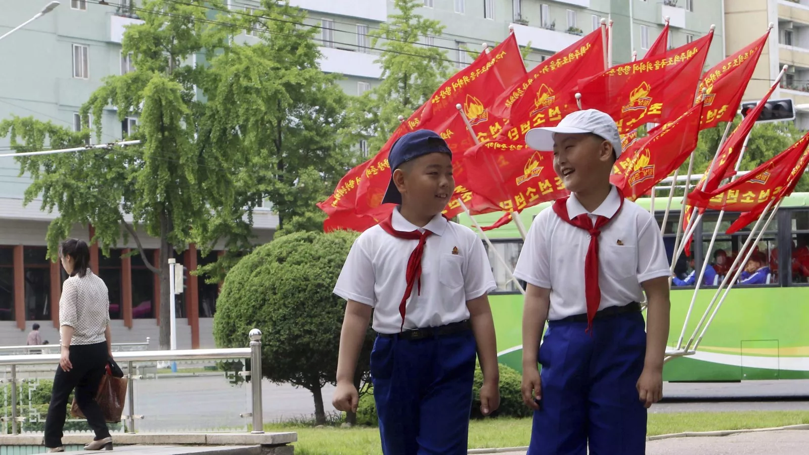 https://d.newsweek.com/en/full/2660832/boys-walk-north-korean-capital.webp?w=1600&h=900&q=88&f=9af4a48aa9371902a144772817556cf2