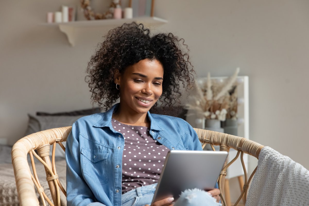 A woman reads an ebook