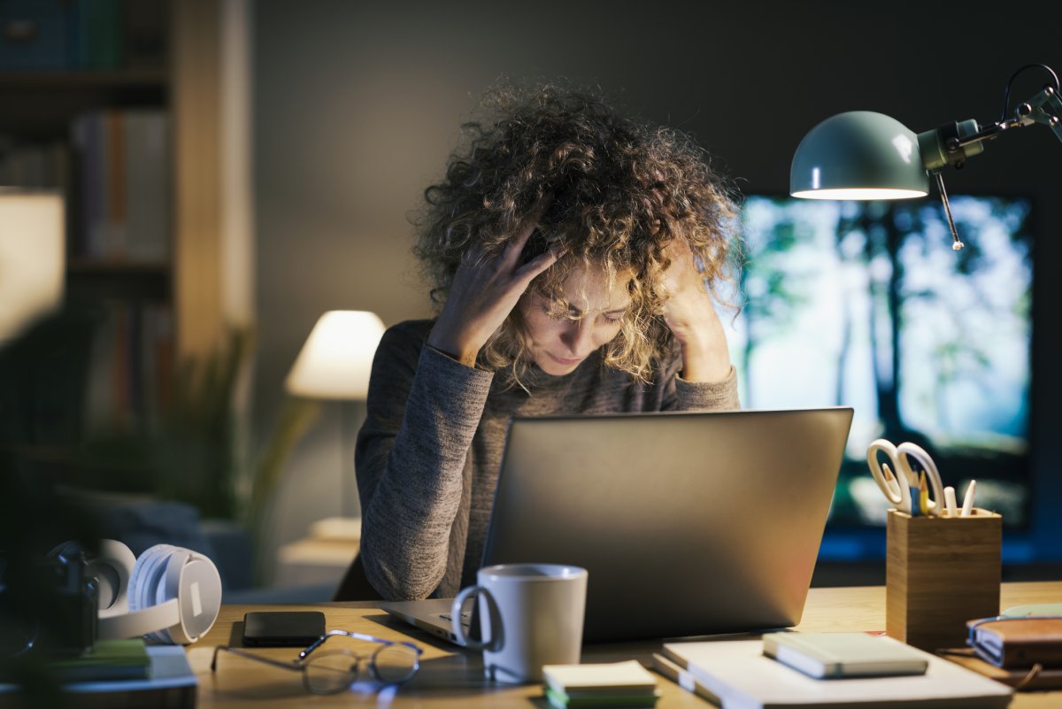 A woman works late