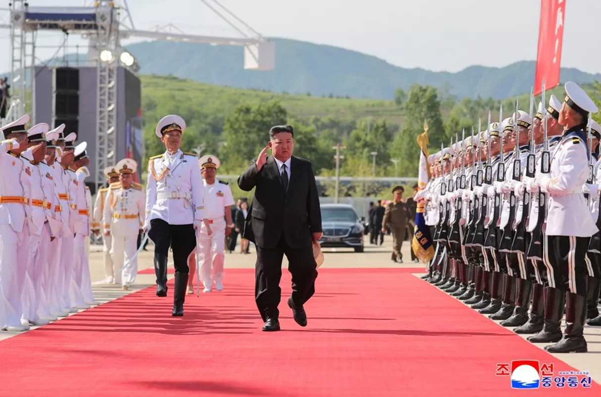 https://d.newsweek.com/en/full/2666620/kim-attends-destroyer-launch.webp