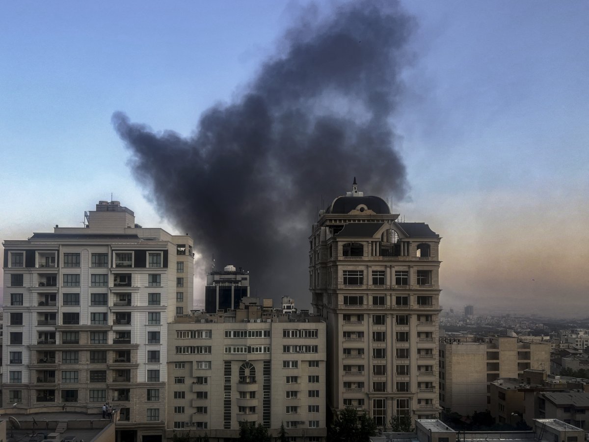 Smoke rises from the state media building 