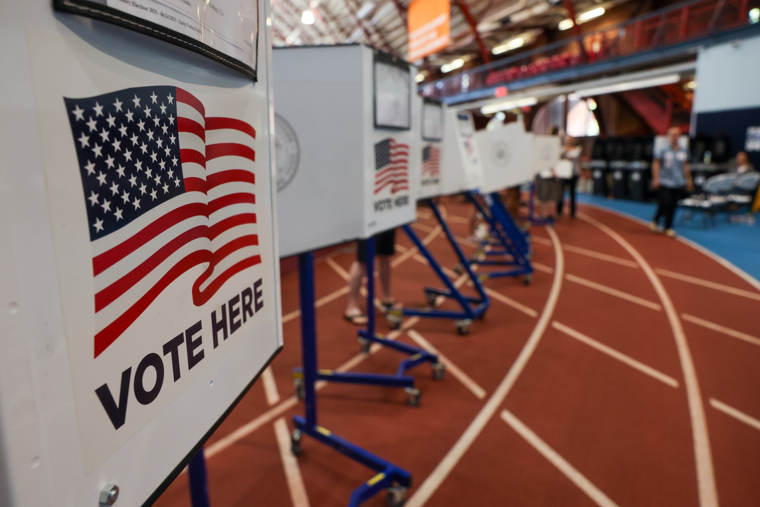 https://d.newsweek.com/en/full/2670617/voting-booths-new-york-city.jpg