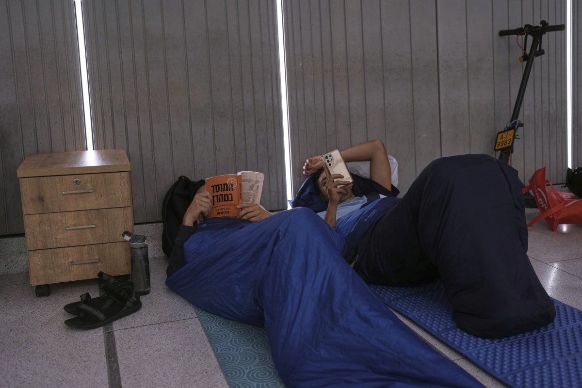 Man reads book about Mossad