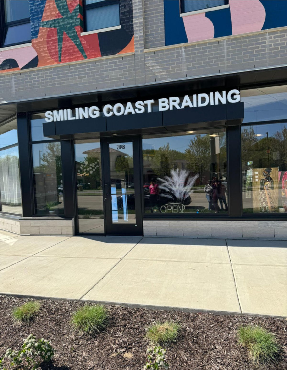 Sort smiling braids Madison Wi