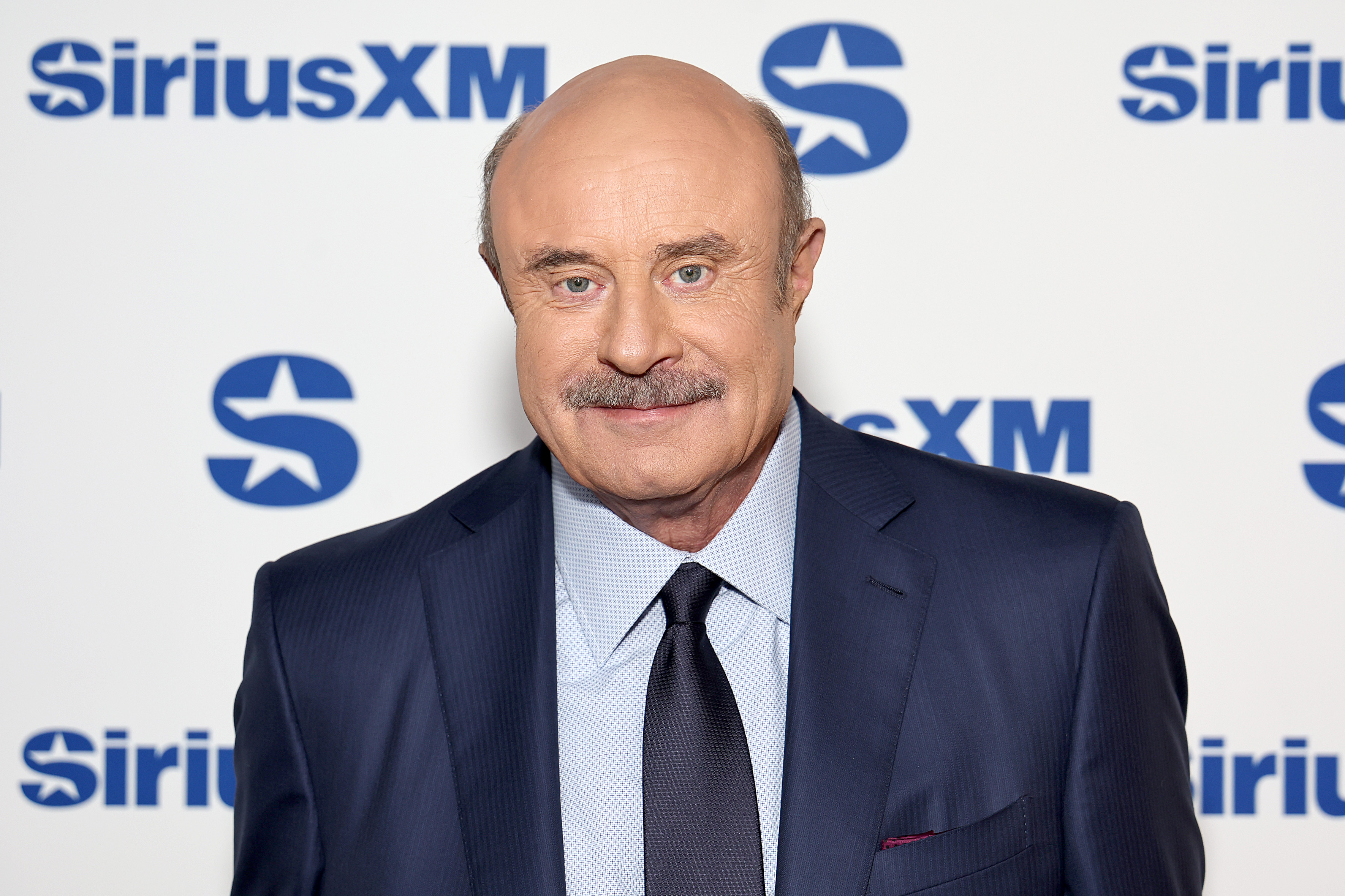 Dr. Phil's Media Company Accuses Christian Network of 'Sabotage' - Newsweek