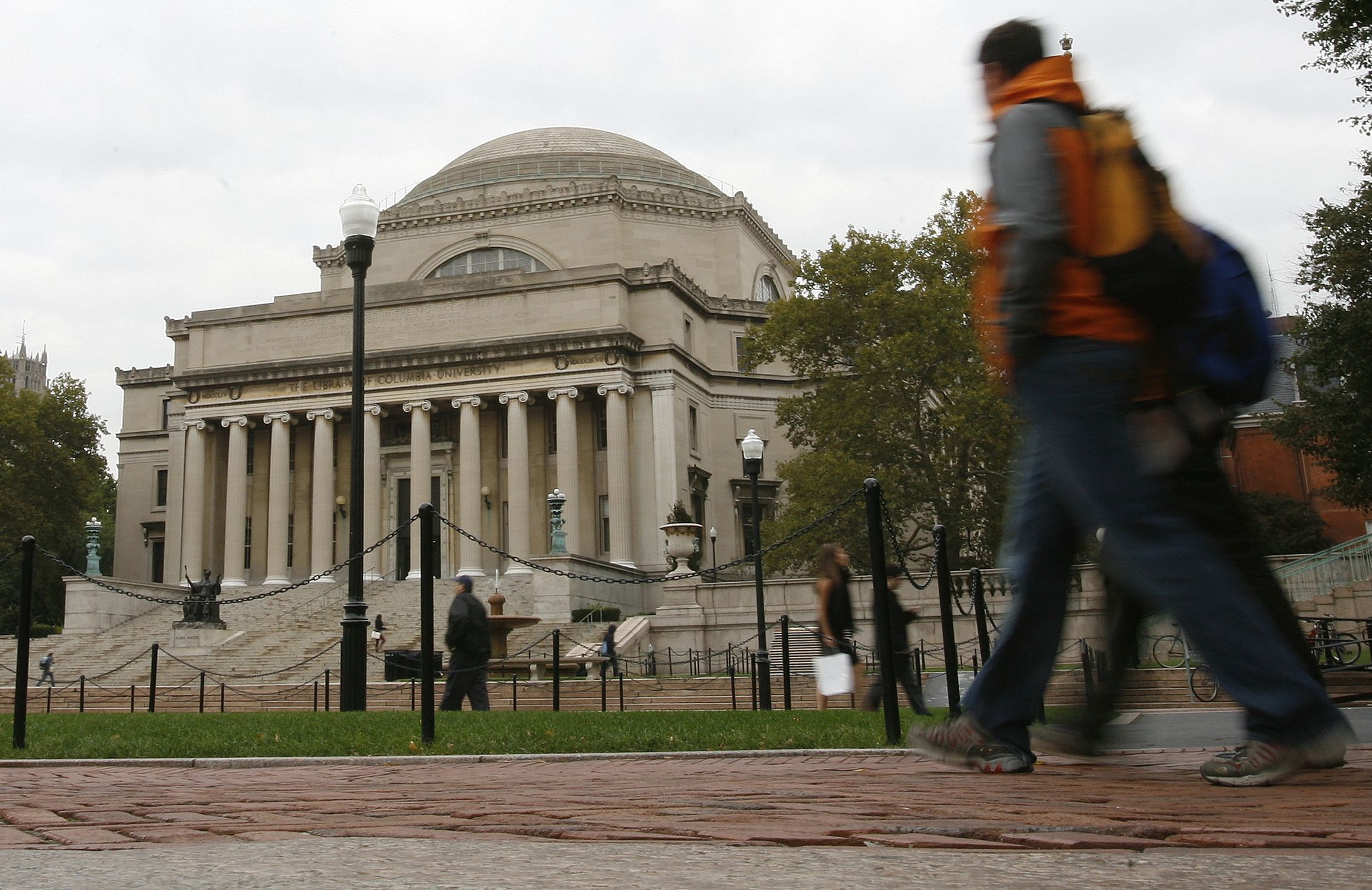 Students walk across the campus of Columbia University in New York in this picture taken October 2, 2009.