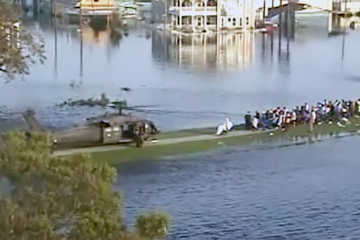 A military helicopter arrives.