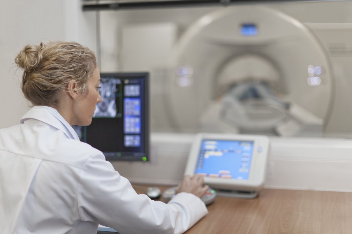 Doctor running CT scans