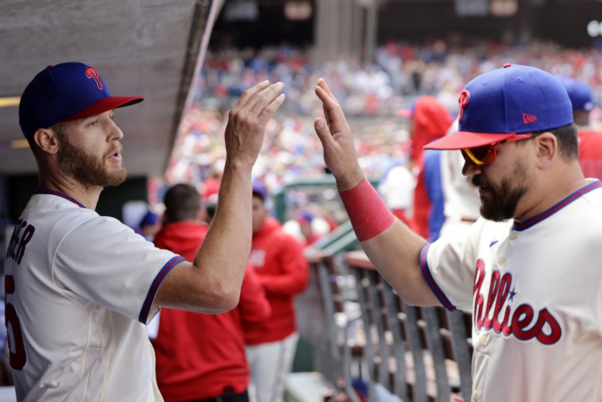 Kyle Schwarber y Zack Wheeler