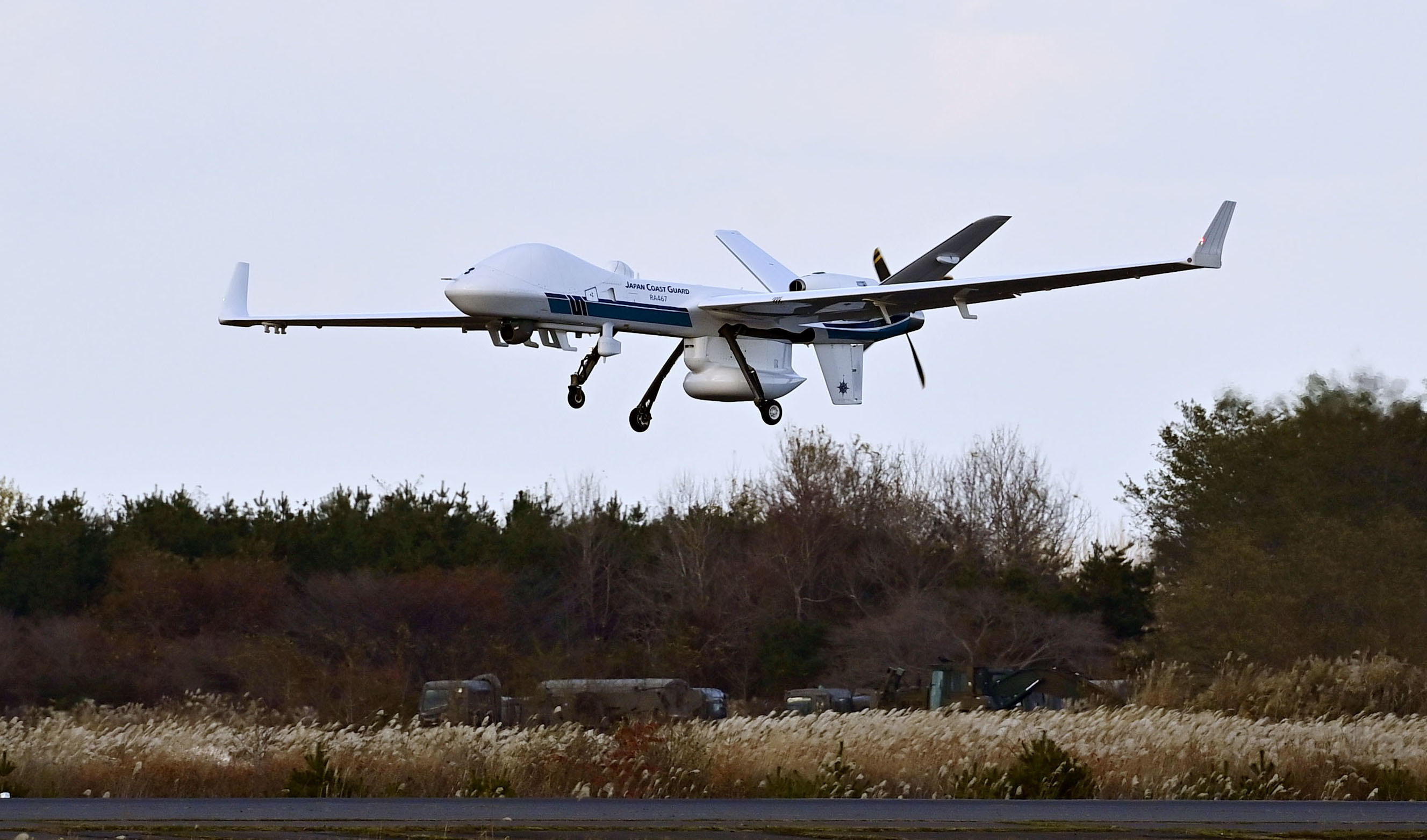 https://d.newsweek.com/en/full/2706044/japan-coast-guard-mq-9b-seaguardian-drone.jpg
