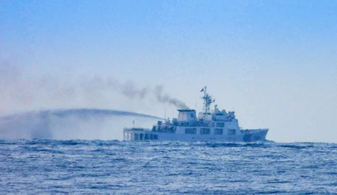 https://d.newsweek.com/en/full/2707509/china-coast-guard-conducts-water-cannon-training.webp