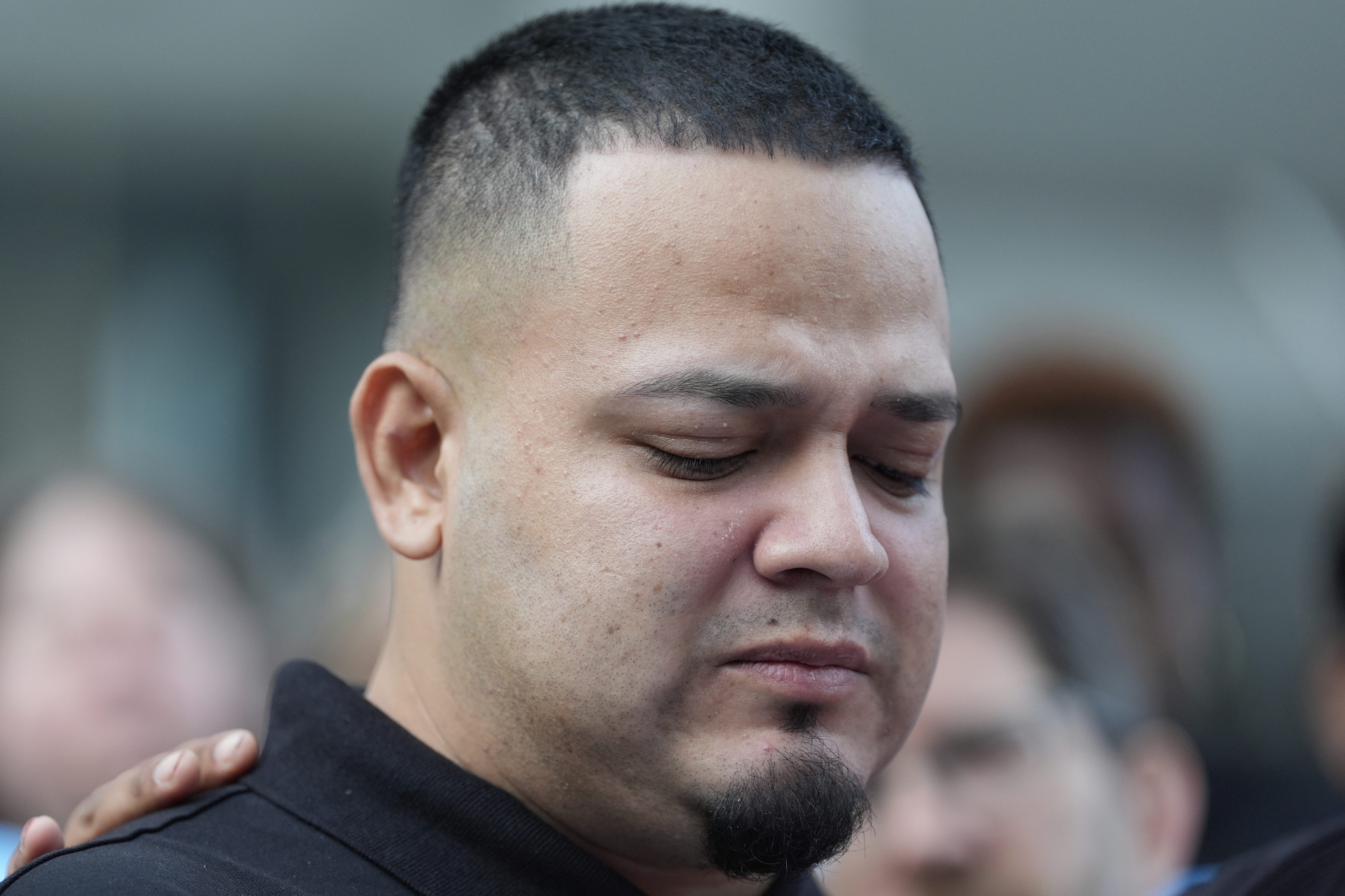 Kilmar Abrego Garcia attends a protest rally 