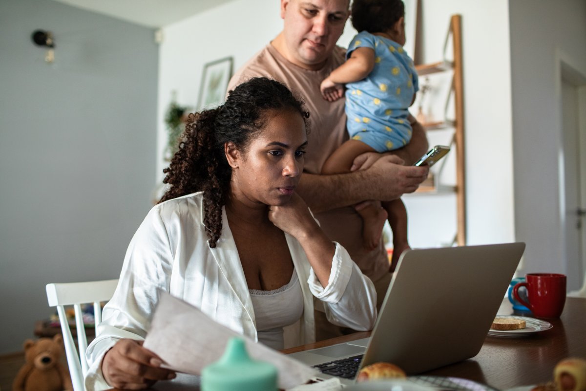 stock image family at computer