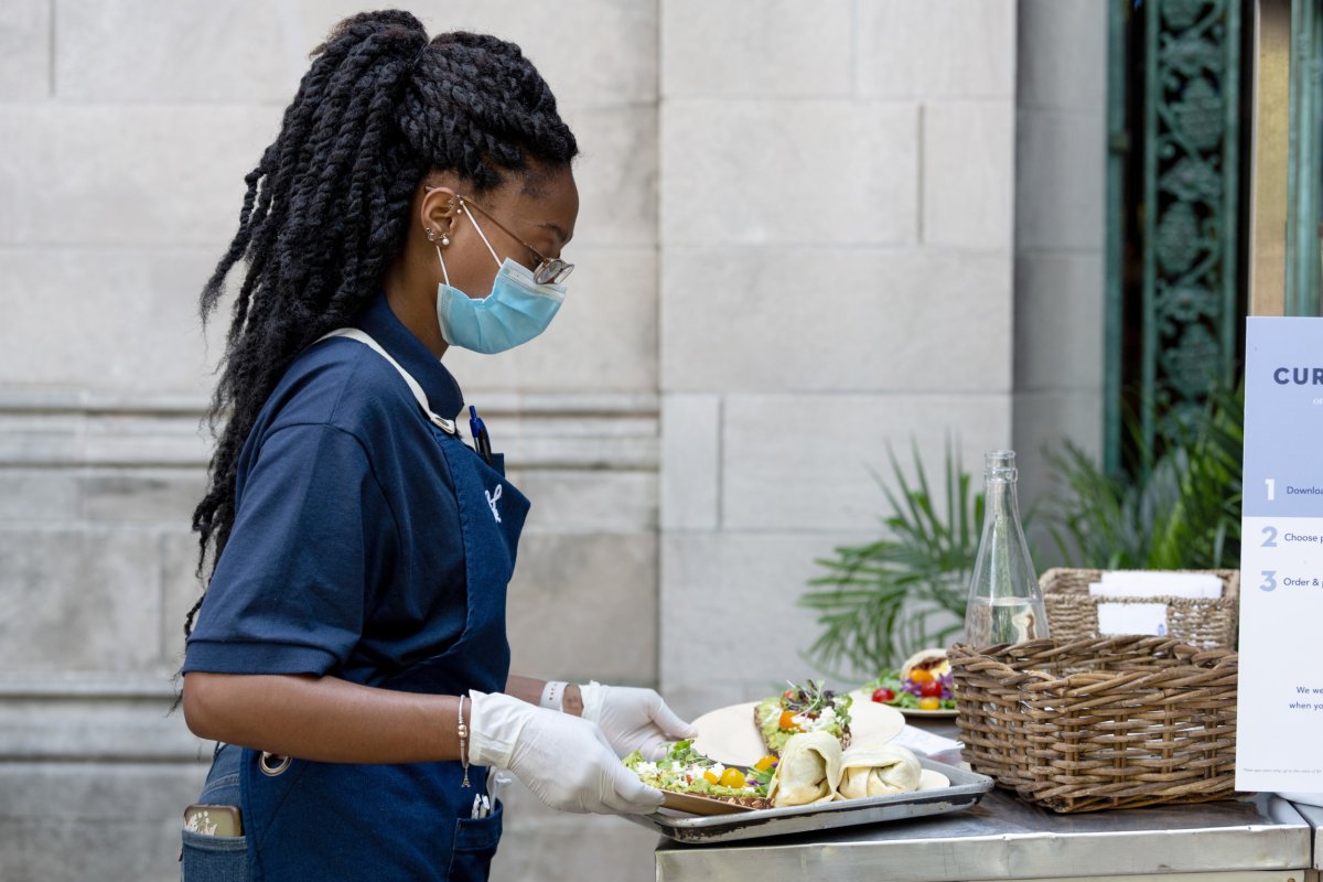 Waitress serving food