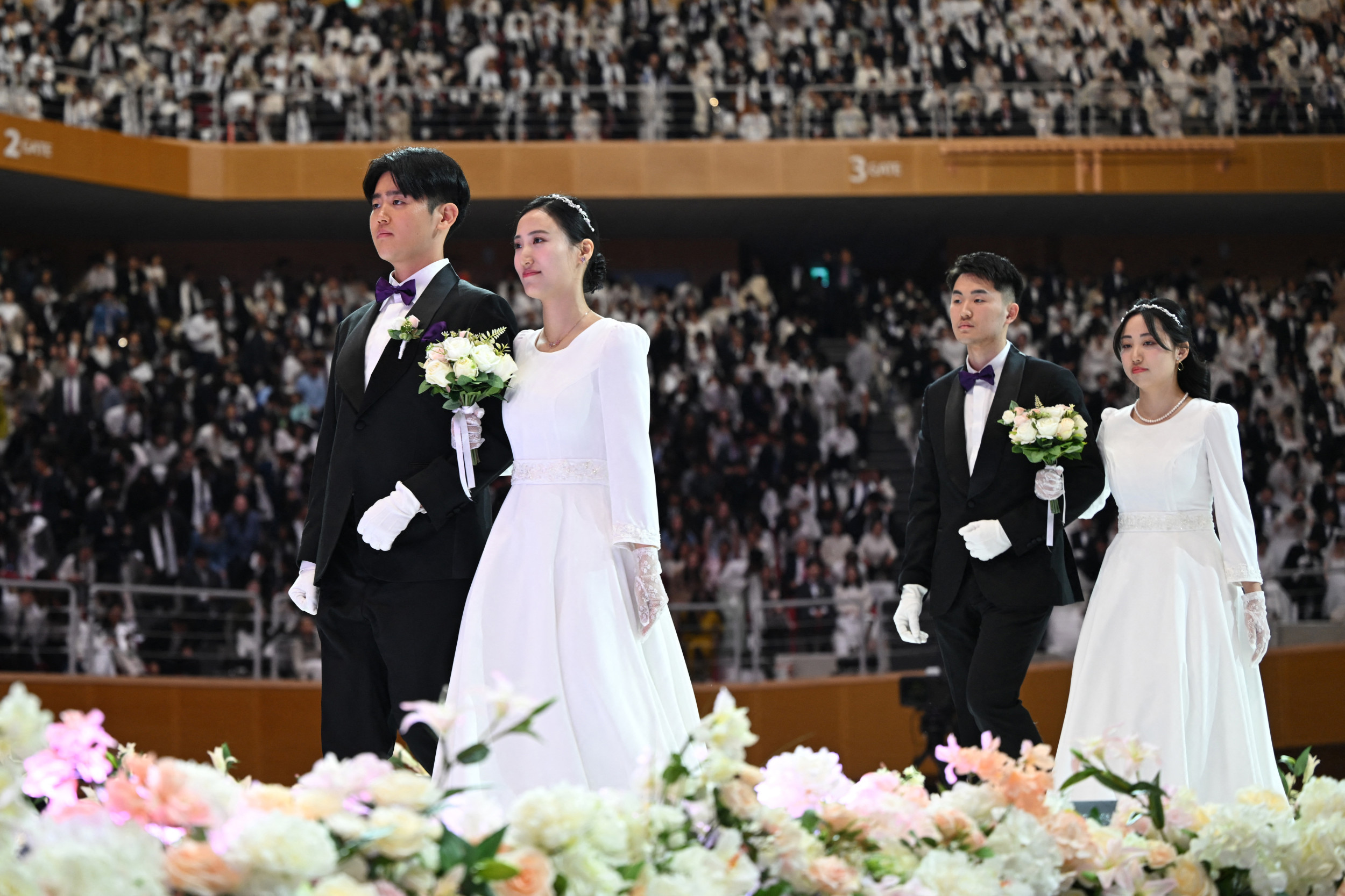 https://d.newsweek.com/en/full/2715817/south-koreas-unification-church-holds-mass-wedding.jpg