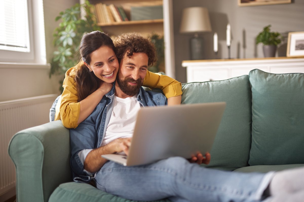 A couple on their laptop