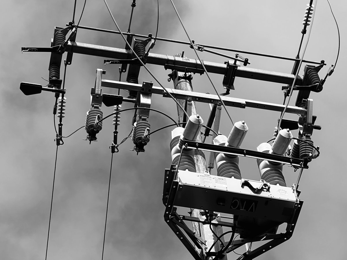 Utility pole with high-voltage power lines