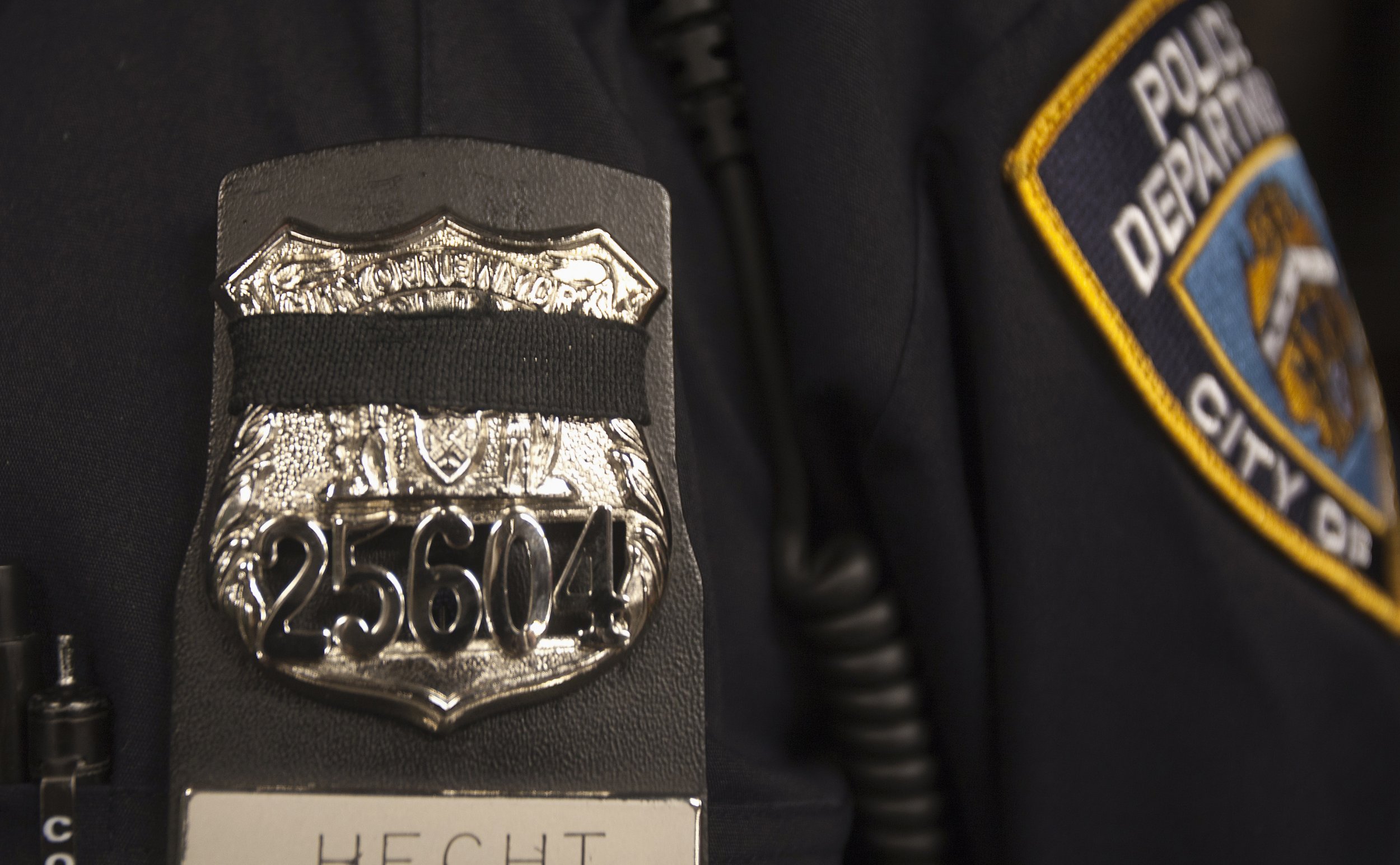 nypd police badge with black band