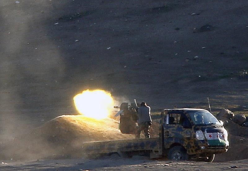 Syrian Rebels fire at Islamic State