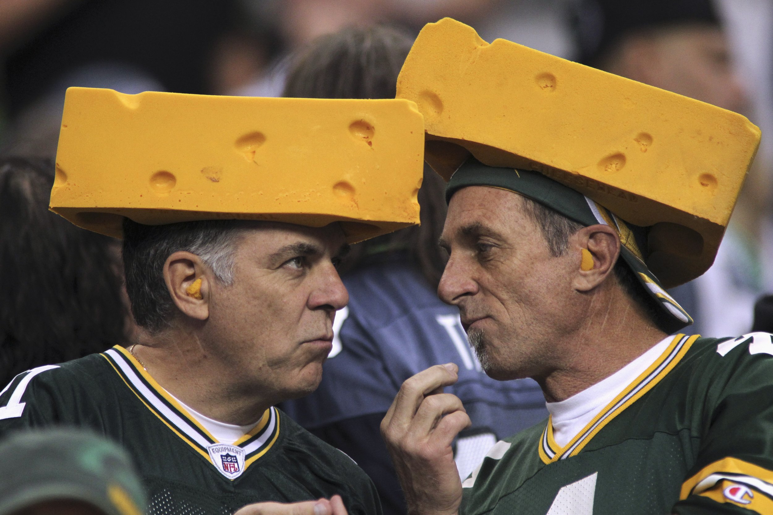 Why do Green Bay Packers fans wear cheese hats?