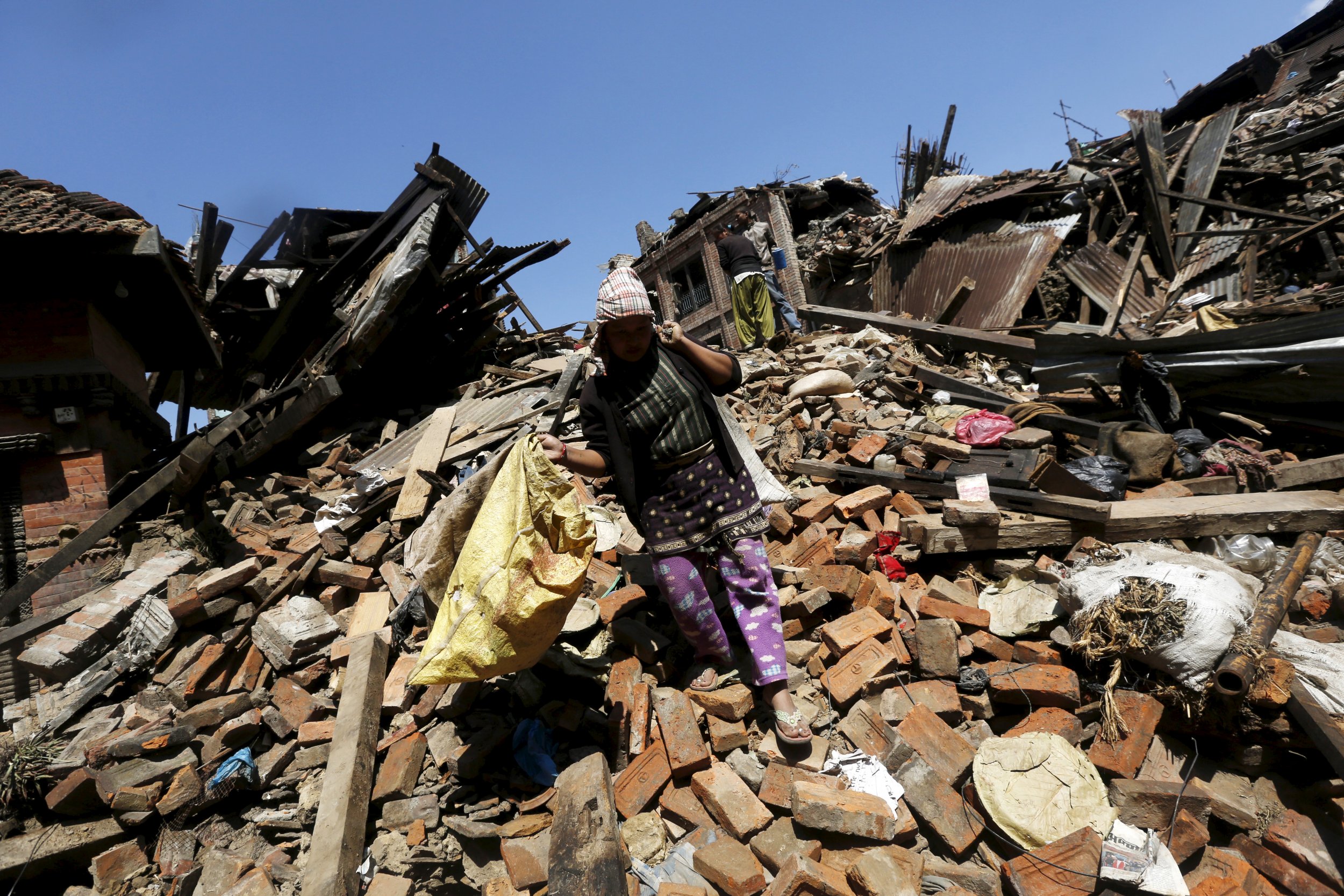 Nepalese woman rubble