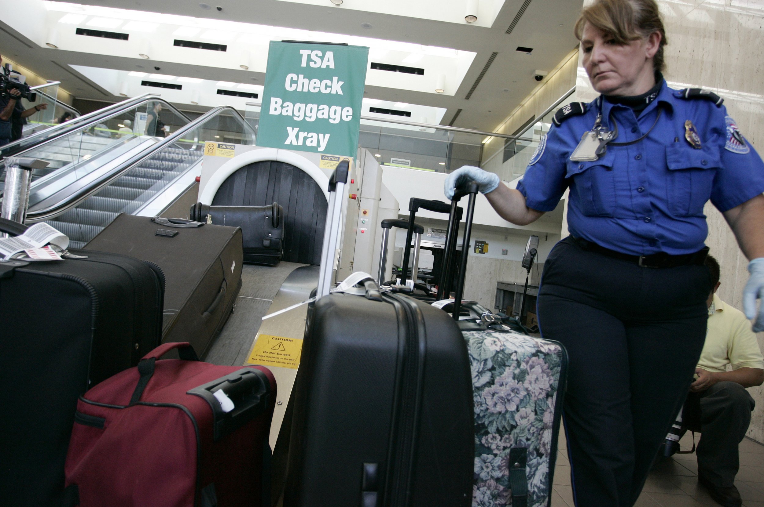 tsa checked baggage weight