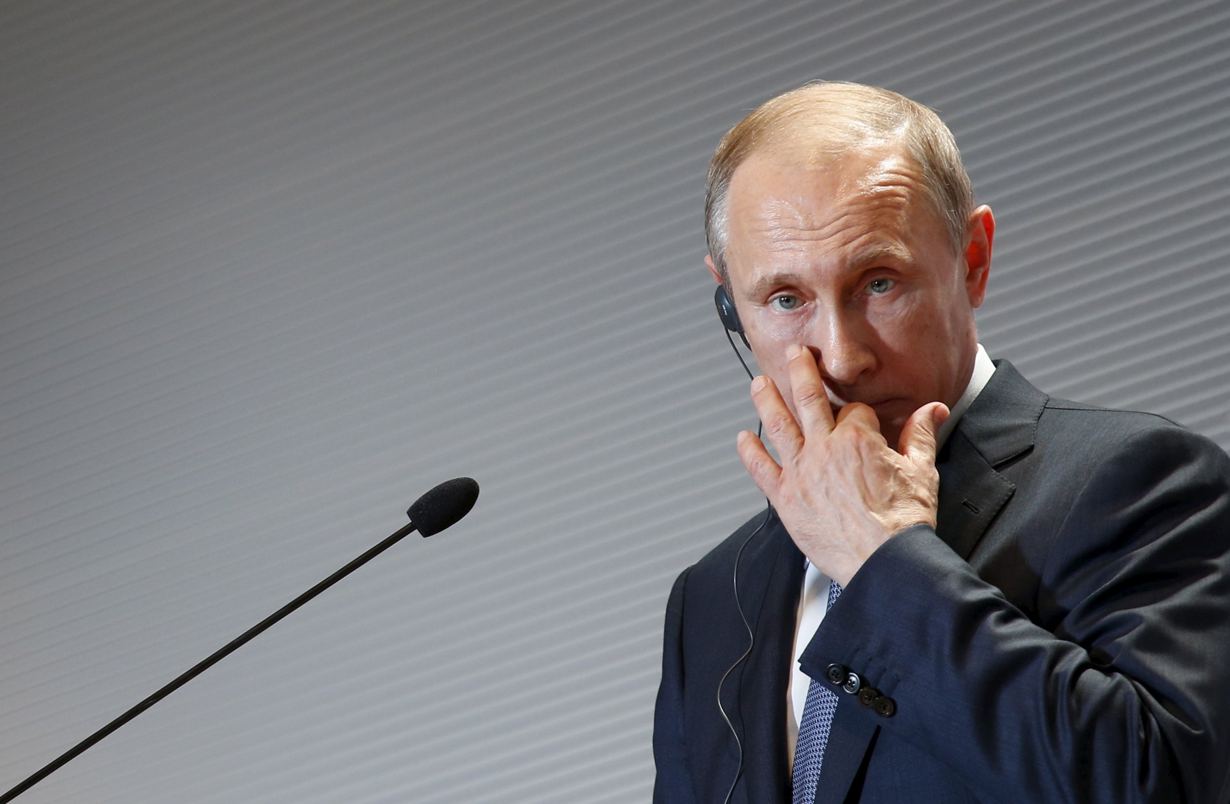 Vladimir Putin at a press conference in Italy